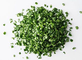 Freshly chopped, vibrant green herbs, scattered in a mound.  Detailed close-up view on white background
