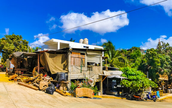 Typical beautiful colorful tourist street sidewalk city Puerto Escondido Mexico. - Powered by Adobe