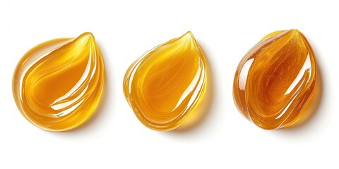 Three golden liquid droplets, smooth and glossy, sit atop a pure white background.  Each droplet has a flowing, teardrop shape, and a slight swirl pattern within
