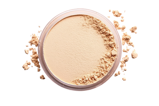 Beige face powder in a round container.  Loose powder scattered around the container