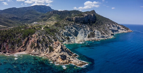 Fototapeta premium Cala Mestres and Punta de l'Aguila, Banyalbufar, Natural area of the Serra de Tramuntana., Majorca, Balearic Islands, Spain