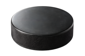 Isolated black hockey puck center shot on a png background, hockey puck, black, isolated, sport, equipment, rubber, ice, round, object, close up, detail, texture, macro, studio shot, cutout