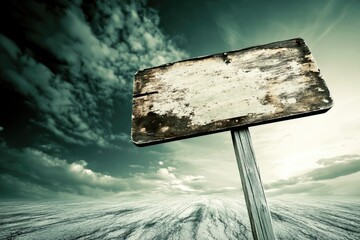 Weathered signpost in dramatic sky