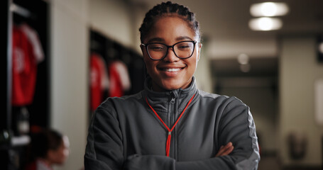 Happy woman, portrait or soccer coach with confidence for leadership or sport coordinator in locker...
