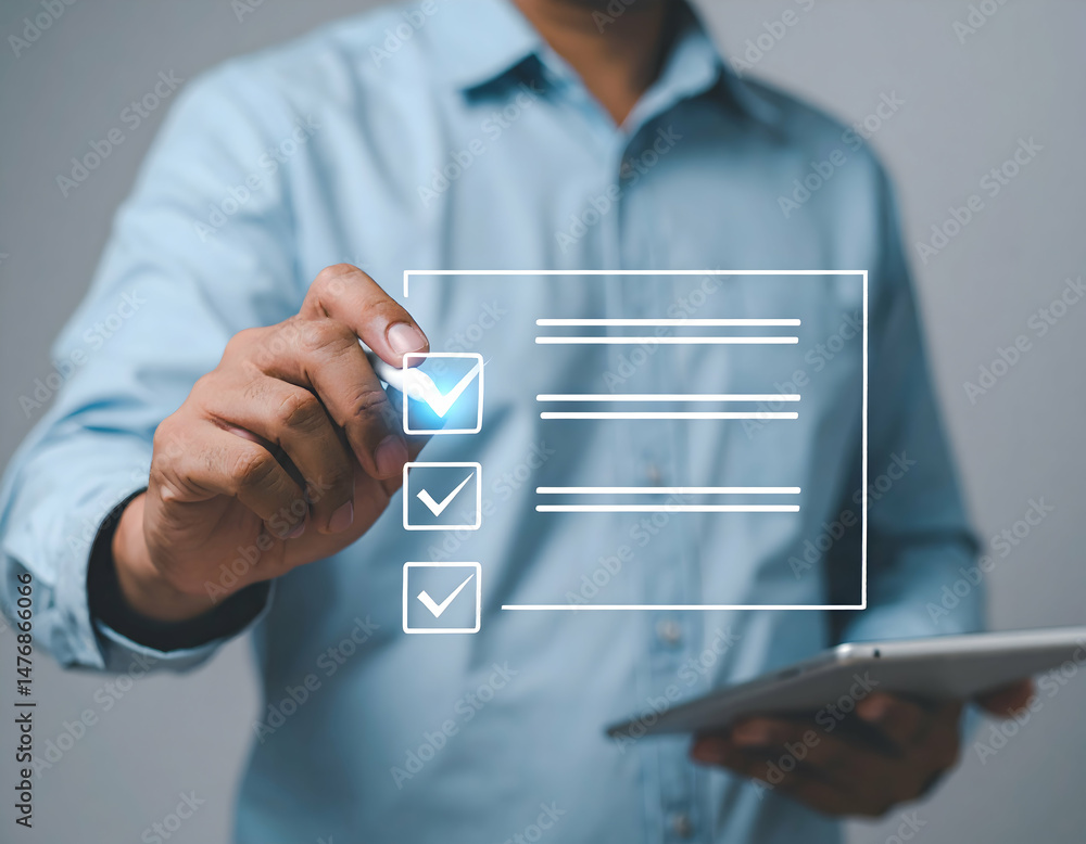 Poster person checks items on a digital checklist displayed on a screen