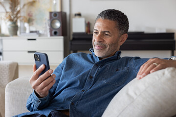 Man Enjoying Leisurely Moment with Smartphone