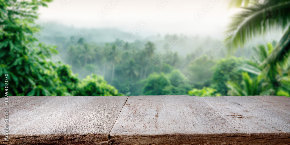 Poster rustic wooden table surface overlooking a lush tropical landscape with greenery and soft mist creati