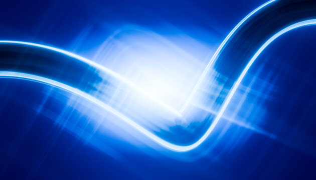 Abstract dynamic blue wave background with glowing effects