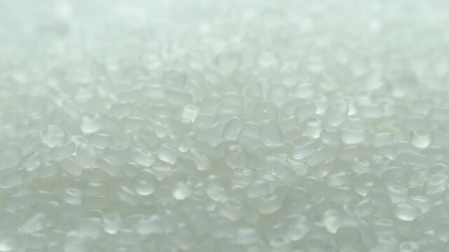 Polypropylene granule close-up background texture