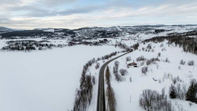 Scenic nordic aerial view of snowy winter landscape