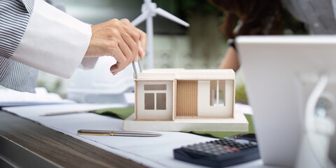 Sustainability in engineering: adjusting details of house model with precision tools