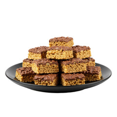 A delectable stack of chocolate-covered rice crispy treats on a sleek black plate
