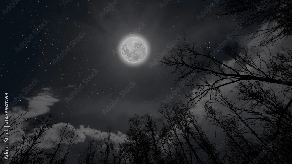 Wall mural a moon moving in the night sky with stars and clouds