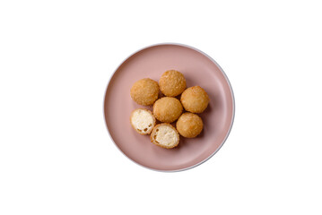 Cheese fried balls or croquettes with potatoes or rice