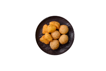 Fried mozzarella or brie cheese with cranberry or raspberry sauce