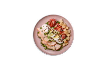 Bowl with caesar salad with chicken, parmesan cheese, tomatoes, croutons, lettuce leaves