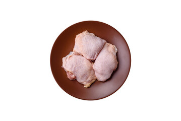 Chicken thigh raw, fresh poultry meat with salt and spices