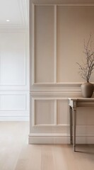 A minimalist interior corner with light wooden flooring, white moldings, a wooden side table, black vase with dry branches, and books.