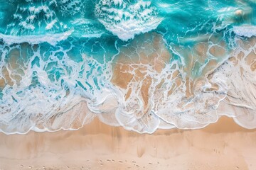 Obraz premium Stunning aerial view of turquoise ocean waves gently washing ashore a pristine sandy beach, creating a mesmerizing natural pattern