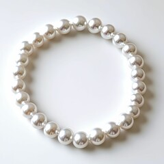 Obraz premium Elegant pearl necklace, lustrous spheres, simple elegance.
