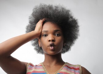 black woman deforms her mouth