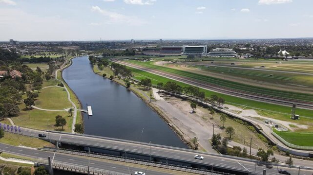 Aerial drone above river, showcasing Flemington Racecourse, Melbourne