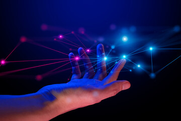 The hand of a businessman interactive touching a holographic of a financial network, symbolizing the possession of technology artificial intelligence