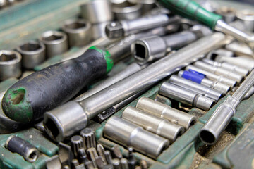 Closeup photo shoot of different nesessary tools and parts in every man's garage.Auto check up and...