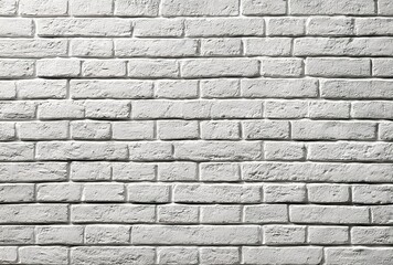 Obraz premium White-painted brick wall with neat arrangement and subtle surface texture.
