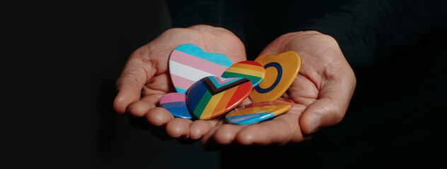 badges with different LGBTQ flags, web banner