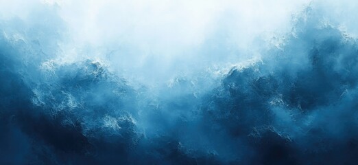 Obraz premium A misty, ethereal view of a vast, blue landscape.