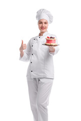 Happy confectioner in uniform holding delicious cake with berries and showing thumbs up on white background