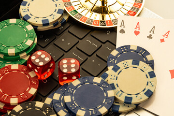 Image showcases casino game items poker chips, cards, roulette wheel segments for promotional purposes