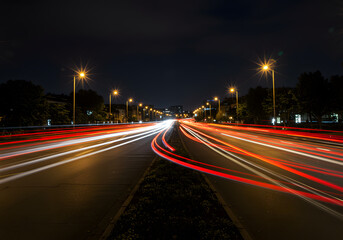 Night highway with light trails transportation and urban landscape