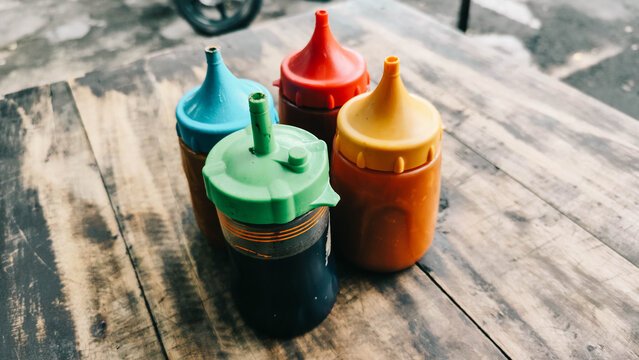 several bottles of sous vide, soy sauce and chili sauce