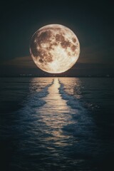 Dramatic full moon rising over ocean waves at night creating path of light with distant city skyline in dark sky