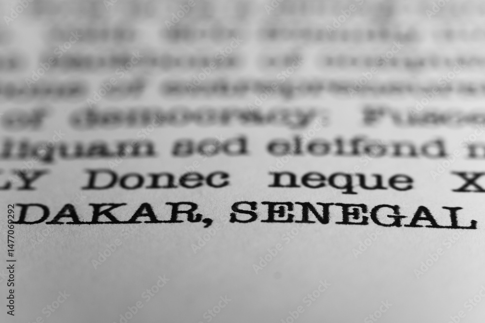 Fototapete dakar, senegal. text printed on a page. a piece of paper with a phrase written in retro typewriter f