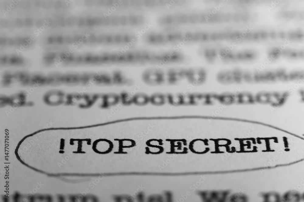 Fototapete top secret. text printed on a page. a piece of paper with a phrase written in retro typewriter font