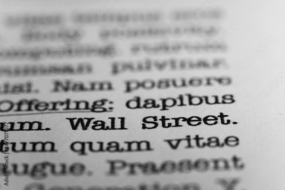Fototapete wall street. text printed on a page. a piece of paper with a phrase written in retro typewriter font