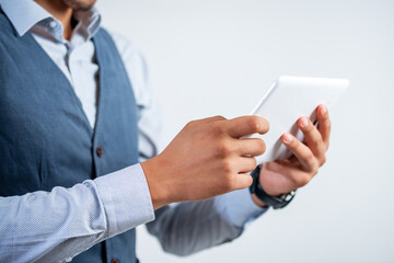 Young businessman looking at tablet