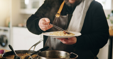 Cooking, food and hands of man with plate in kitchen of home for diet, private service or nutrition. Ingredients, recipe and personal chef with dish in house for gourmet cuisine, hospitality or lunch