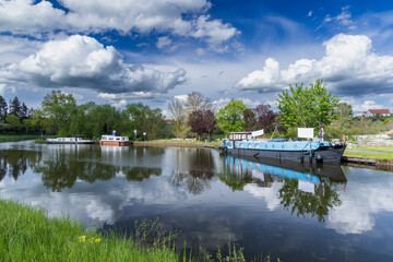 Canal du centre reflecting clouds in Saint Julien sur Dheune, Saone et Loire, Bourgogne Franche Comte, France