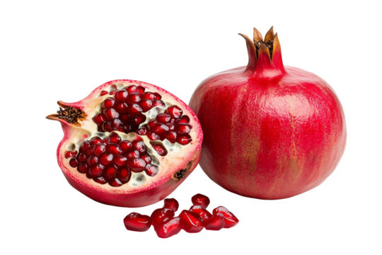 A fresh ripe organic split pomegranate on a white background