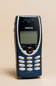 Pavia, Lombardy, Italy - November 23, 2024: Nokia 8210 Cellular Phone from 1999 at MUSDI Museum. It weighed 79gr and had a battery duration (in calling) of 3 hours