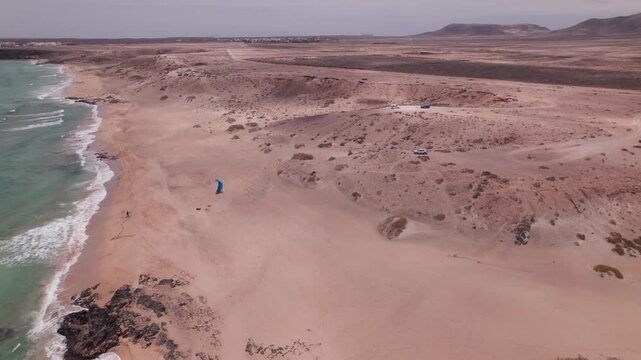Drone Over Playa Mallorquines with Parasailer and Crashing Waves, Fuerteventura