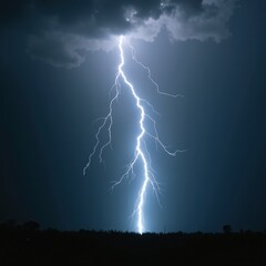 A powerful lightning bolt strikes from a dark storm cloud, illuminating the night sky above a silhouetted landscape.