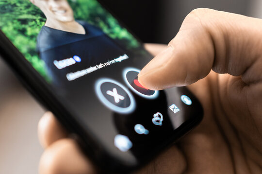 Date app. Gay man swipe and match. Romance scam. Dating site in phone. LGBT on social media. Like profile picture of a single guy. Online love mobile application. Cheating on internet.