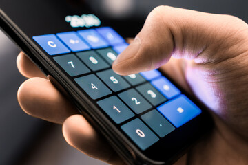 Calculator in phone. Budget and cost for family living expenses. Inflation, tax, price or saving money concept. Financial plan or mortgage in household. Man using smartphone. Consumer market.