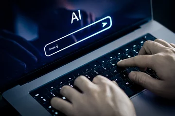 AI prompt to generate content or text with laptop and artificial intelligence. Using image generator at work. Chatbot or virtual search robot in computer. Large language model, LLM. Hands typing. © terovesalainen