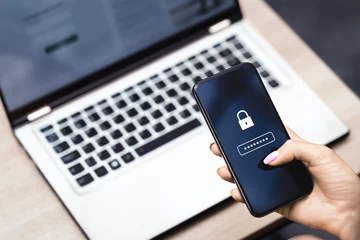 Password to protect data in phone. Cyber security against fraud and scam. Privacy lock online. Smartphone and laptop computer. Strong safety and safe payment. Forgot bank account information. © terovesalainen